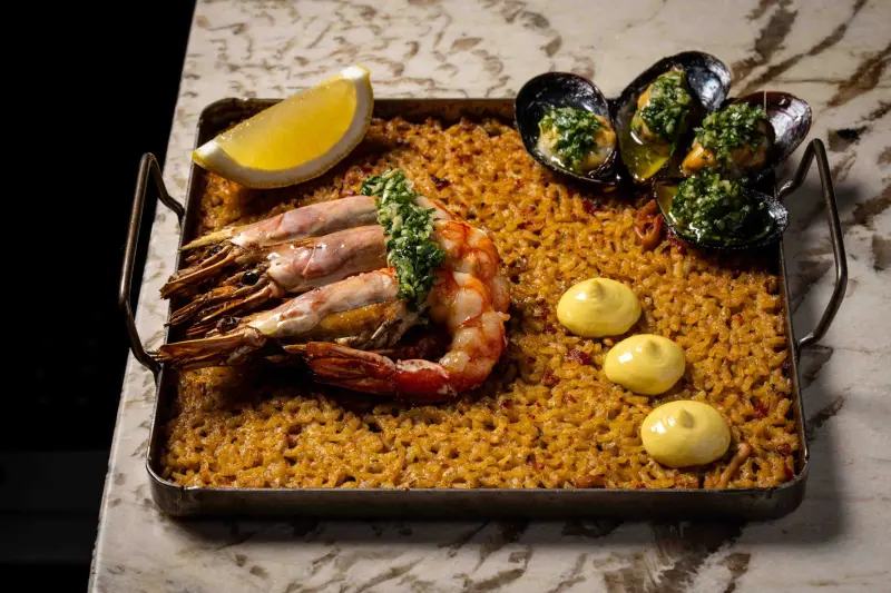 Food, drinks and the room at Barra Oliba in Little Italy